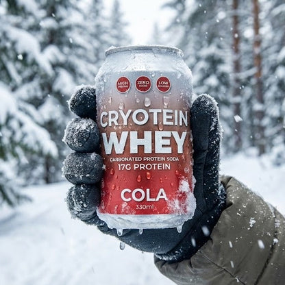 Person holding a can of Cryotein Whey Cola in a snowy forest